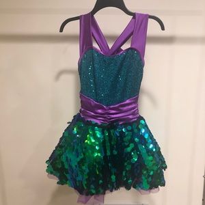 Purple and green, sparkly dress.